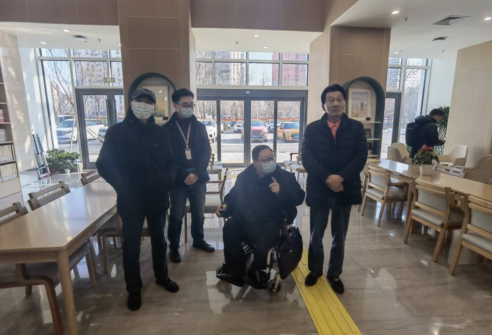 中国电子商会会长王宁一行到北京市残疾人服务示范中心参观座谈